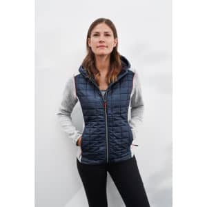 A ladies' knitted hybrid jacket featuring a navy quilted front and grey sleeves, with a hood and zip closure.