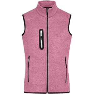 A pink knitted fleece vest featuring a high collar and zippered pockets, with contrasting black accents.