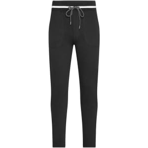 Black jog-pants with a drawstring waist and two front pockets, featuring a logo on the waistband.