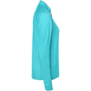 A turquoise ladies sports shirt with a half-zip design and long sleeves, featuring a logo.