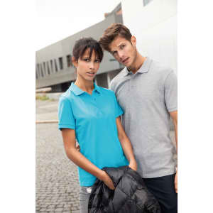 A blue polo shirt and a grey polo shirt worn by a woman and a man, with a black jacket draped over the woman's arm.