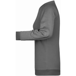 A grey ladies' sweater featuring a long silhouette and ribbed detailing at the cuffs. It includes a logo.