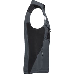 A grey softshell vest with black accents, featuring pockets and a logo on the upper section.