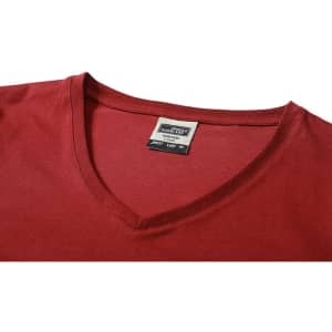 A red ladies' workwear T-shirt featuring a V-neck design and a label inside the neckline.