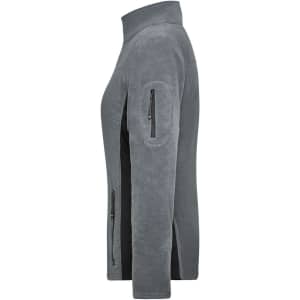 A grey polar fleece jacket featuring zippered pockets and a high collar, with a logo on one sleeve.