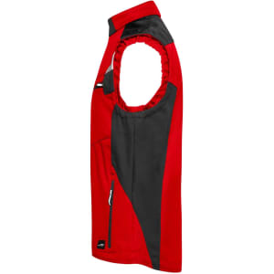 A red and black softshell vest featuring a zippered pocket and a logo. Designed for workwear purposes.