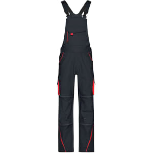 Workwear pants with bib in black featuring red accents and multiple pockets. Includes adjustable shoulder straps.