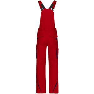 Red workwear pants with bib design, featuring adjustable straps and multiple pockets for utility.