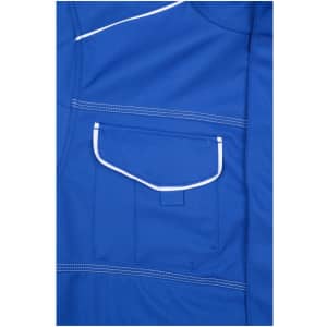A blue softshell jacket featuring a pocket with contrasting white stitching and piping. The jacket has a branding logo.