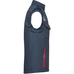 A navy blue softshell vest with red accents, featuring a zip pocket and a logo.