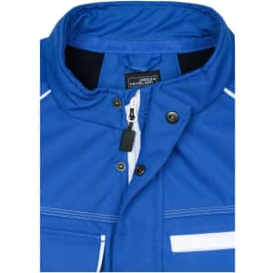 A blue softshell vest featuring a high collar, zip closure, and pockets, with a logo on the label.