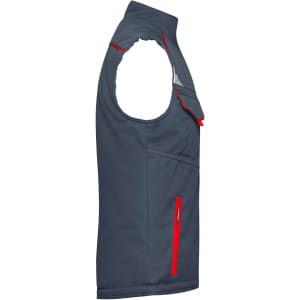 A grey softshell padded vest with red zip and detailing, featuring a pocket and a logo. Side view of the workwear item.
