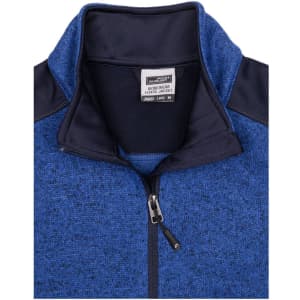 A blue ladies knitted workwear fleece jacket with a navy collar and a zip. It features a logo on the chest area.