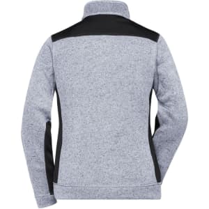 A grey knitted fleece jacket with black panels on the shoulders and sides, featuring a collar and a logo.