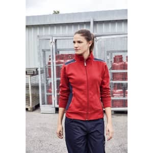 A red sweat jacket with contrasting navy accents, worn by a woman in a casual outdoor setting.