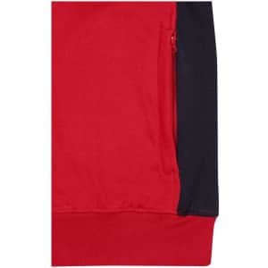 A red and navy sweat jacket featuring a zippered pocket and a logo on the fabric.