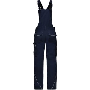 Workwear pants with bib in navy blue, featuring adjustable straps and multiple pockets. Includes a logo.