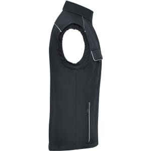 A black workwear softshell vest featuring a zippered pocket and no sleeves, with a smooth exterior and subtle piping details.