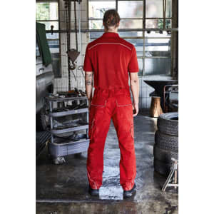 A red work polo shirt with white detailing, worn with matching red work pants, viewed from the back.