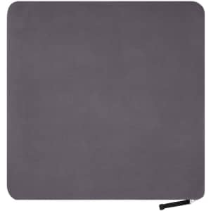 A grey fleece blanket with a smooth texture and a zip closure at one edge. It features a brand logo.