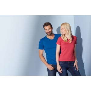 A blue men's V-T shirt and a pink women's V-T shirt are displayed on a light background. Both models are smiling.