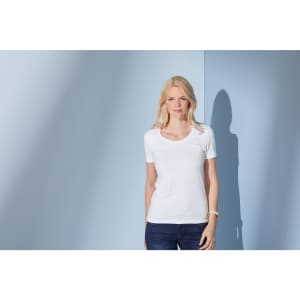 A white ladies' t-shirt with a round neckline and short sleeves, modelled by a woman against a blue background.