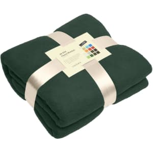 A folded green fleece blanket tied with a ribbon, featuring a label with colour options and a logo.