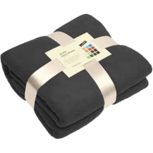 A folded black fleece blanket tied with a ribbon, featuring a label with a logo and colour options.