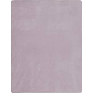A soft, light purple fleece blanket featuring a smooth texture. The blanket has a minimalistic design and includes branding.