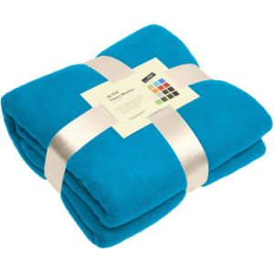 A folded turquoise fleece blanket tied with a ribbon, featuring a label and a logo.