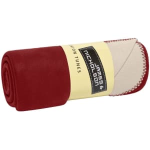 A rolled Bonded Fleece Blanket in red and cream, featuring a label and contrasting stitching.