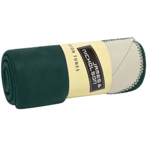 A rolled green and cream bonded fleece blanket with a stitched edge and a visible branding label.