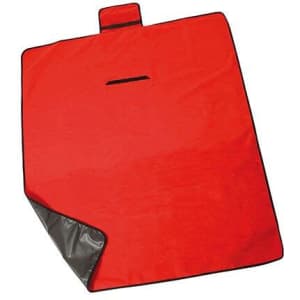 A red picnic blanket with a black edge and a small pocket. It features a branded logo.