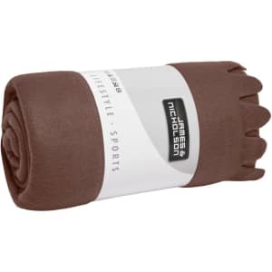 A rolled brown fleece blanket with a branding label. Soft, warm fabric ideal for home use.