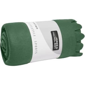 A rolled green fleece blanket featuring a branded label. Soft material suitable for home use.