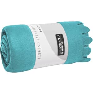 A rolled turquoise fleece blanket with a label featuring branding in white.