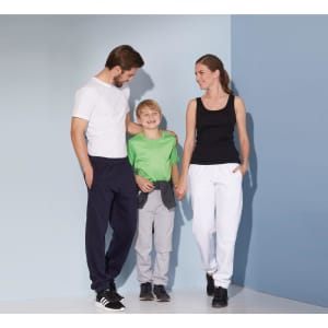 Men's jogging pants in navy, paired with a boy in grey bottoms and a girl in white pants, with a black and green top.