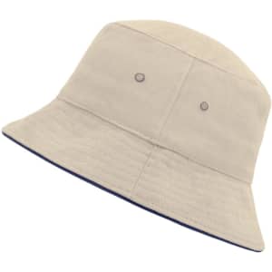 A beige Fisherman Piping Hat with a brim and contrasting navy trim, featuring two ventilation eyelets.