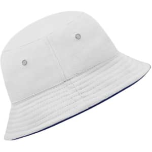 A white bucket hat with a ribbed texture and a blue underside, featuring two ventilation eyelets.