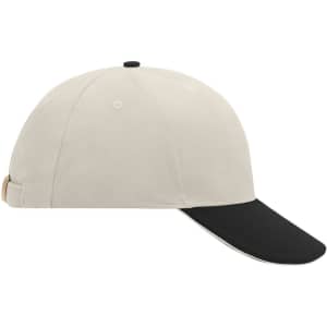 A beige 6-panel sandwich cap with a black peak and an adjustable strap at the back. It features a small logo.