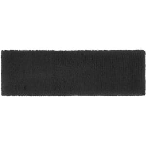 A Terry Headband in black, featuring a soft texture and a simple, rectangular design. It has a logo.