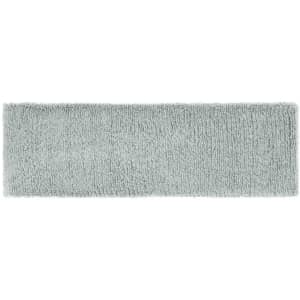 A soft, terry cloth headband in a light grey colour with a textured surface and a logo.
