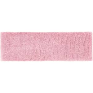 A pink Terry Headband displayed flat, featuring a textured surface and subtle branding.