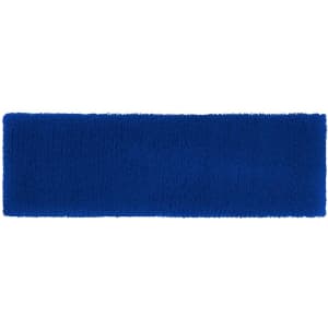 A blue terry headband with a soft, textured surface and a subtle branding logo.