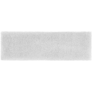 A soft, terry headband in white, featuring a smooth texture and a simple design. It has a logo on the side.