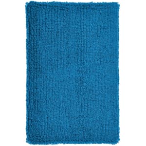 A fluffy blue bath mat with a textured surface and rectangular shape, ideal for adding comfort to any bathroom.