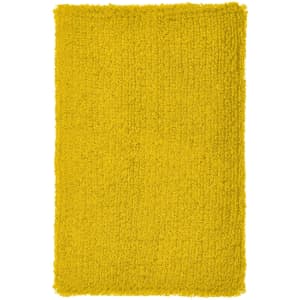 A bright yellow, textured wristband with a fuzzy surface, featuring a simple design.