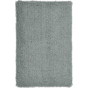 A soft, green, textured wristband with a fluffy surface, suitable for events and exhibitions.