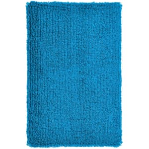 A bright blue, textured, fluffy rectangular fabric, resembling a towel or mat, with an uneven surface.