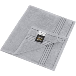 A grey guest towel with a striped design and a label, featuring a folded corner.